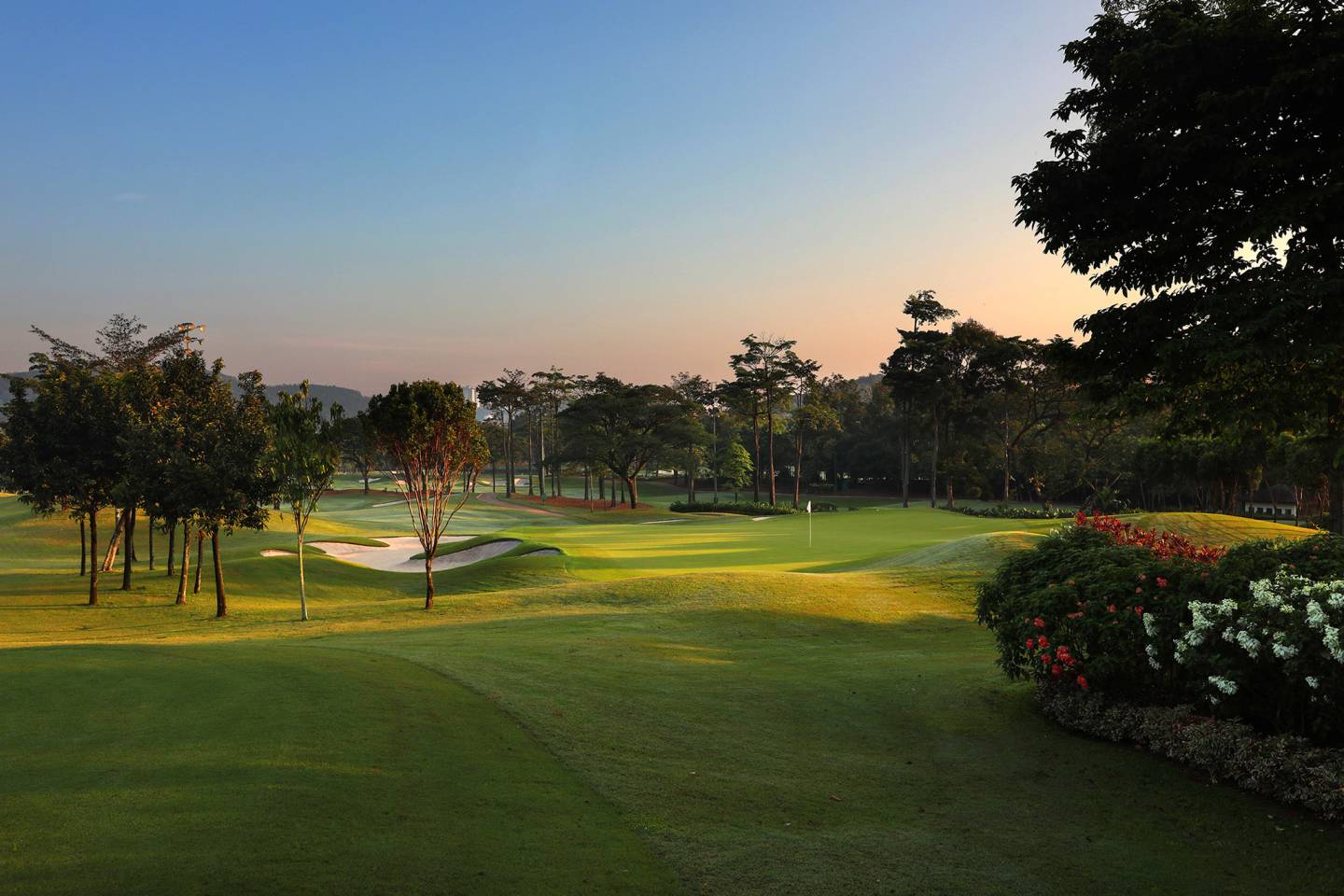 sunset at tropical golf course