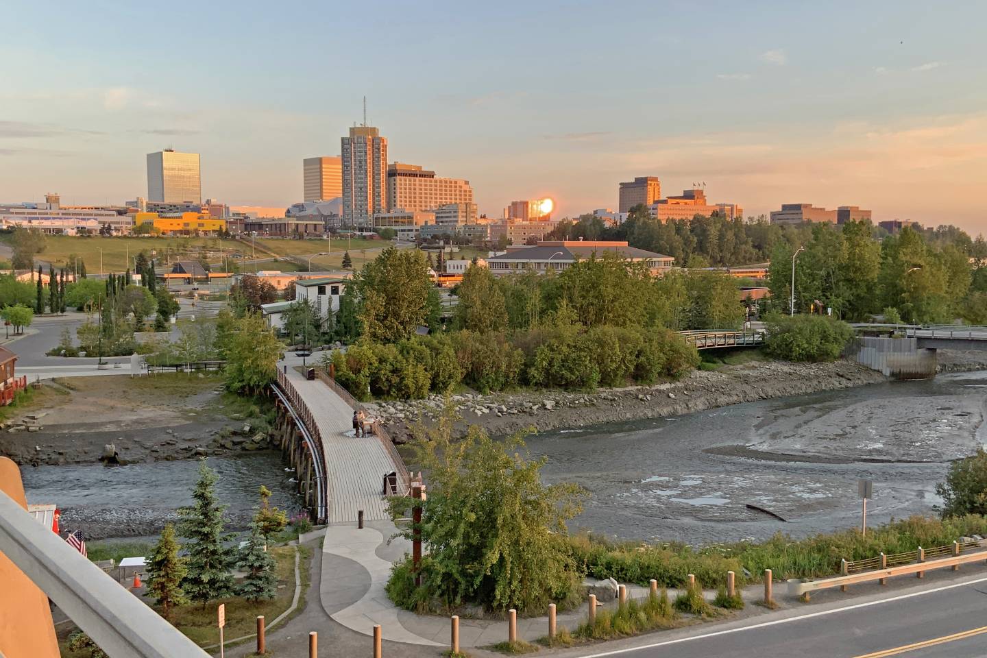 Downtown Anchorage all aglow at midnight with Fish Creek