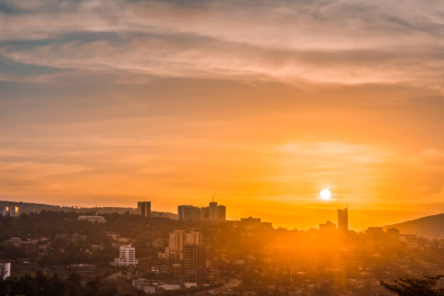 sunset over large city